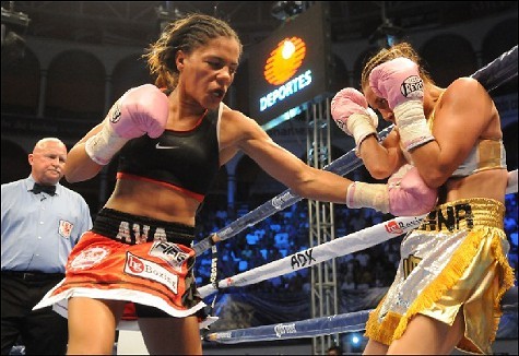Ava Knight (left) locked in hand-to-hand combat with Susana Vazquez Ava Knight (left) locked in hand-to-hand combat with Susana Vazquez