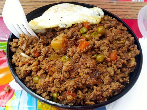 $5 beef torta and fried egg over rice. $5 beef torta and fried egg over rice.
