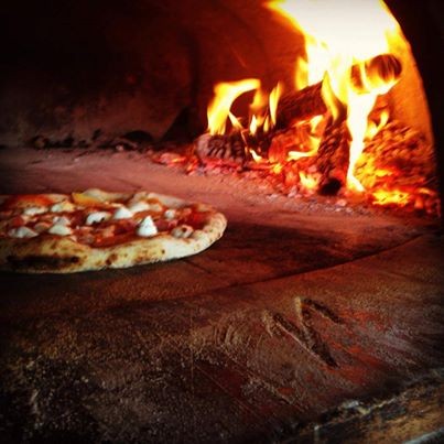 Firing up a pizza at The Forge (via Facebook) Firing up a pizza at The Forge (via Facebook)