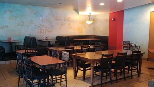Dining room at Crossburgers (via Facebook) Dining room at Crossburgers (via Facebook)