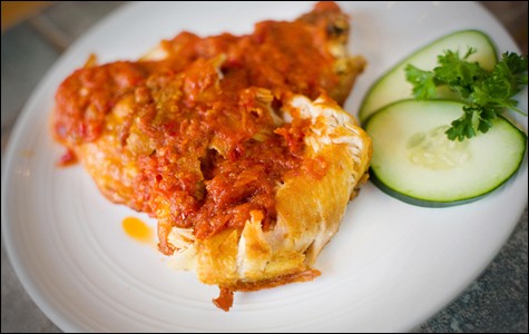 Padis smashed fried chicken with sambal. Padis smashed fried chicken with sambal.