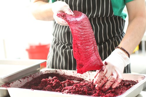Christian Phernetton flavoring salmon with beets. Christian Phernetton flavoring salmon with beets.