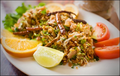 Nam kao at Vientian Cafe is meant to be eaten with your hands.